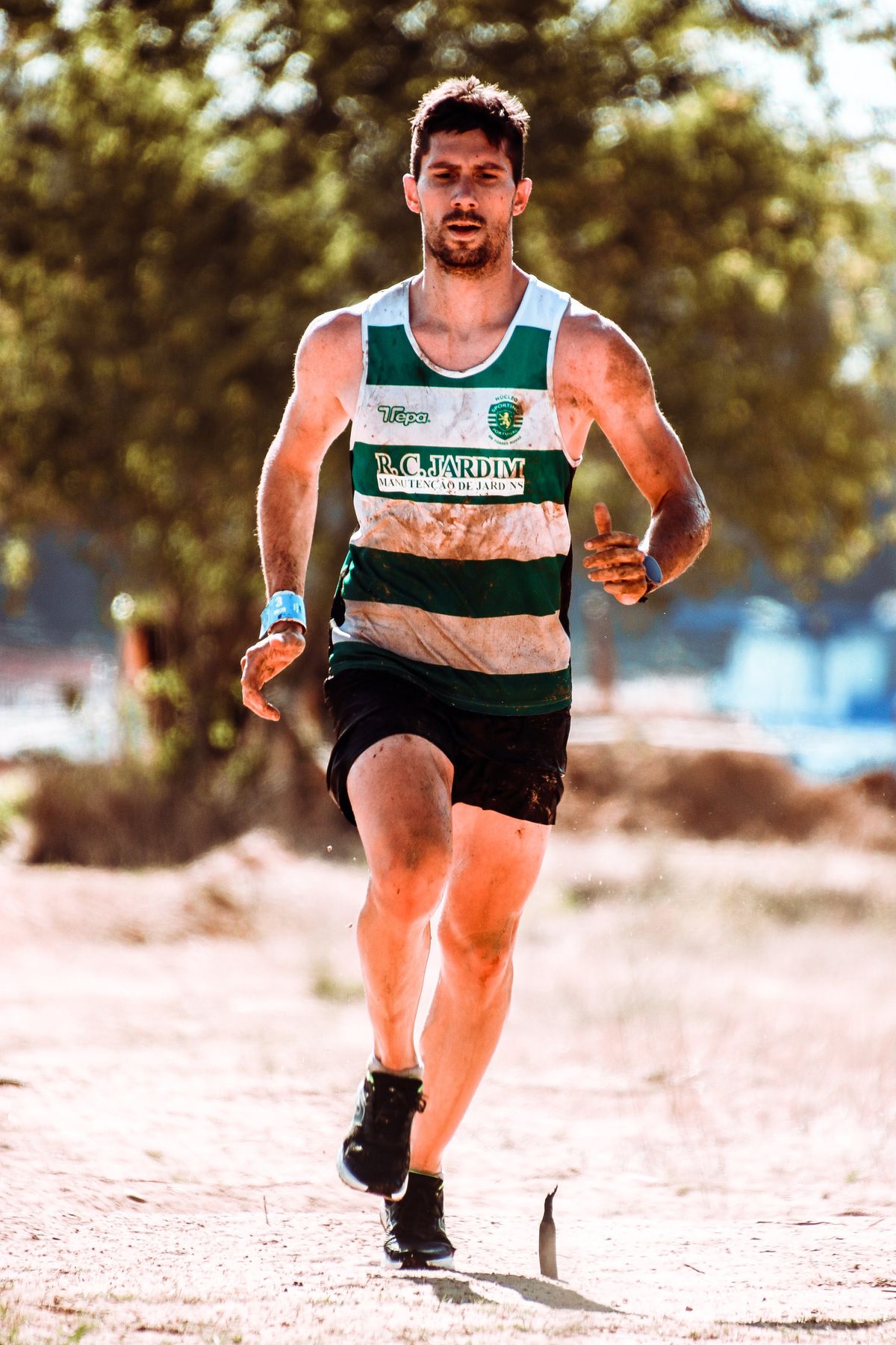 Runner moving outdoors through a natural landscape