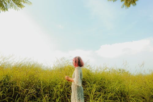Woman Standing Besidegrass