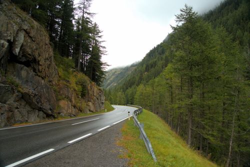 Free Explore the misty mountain roads and lush forests of the Tyrolean Alps in Austria. Stock Photo