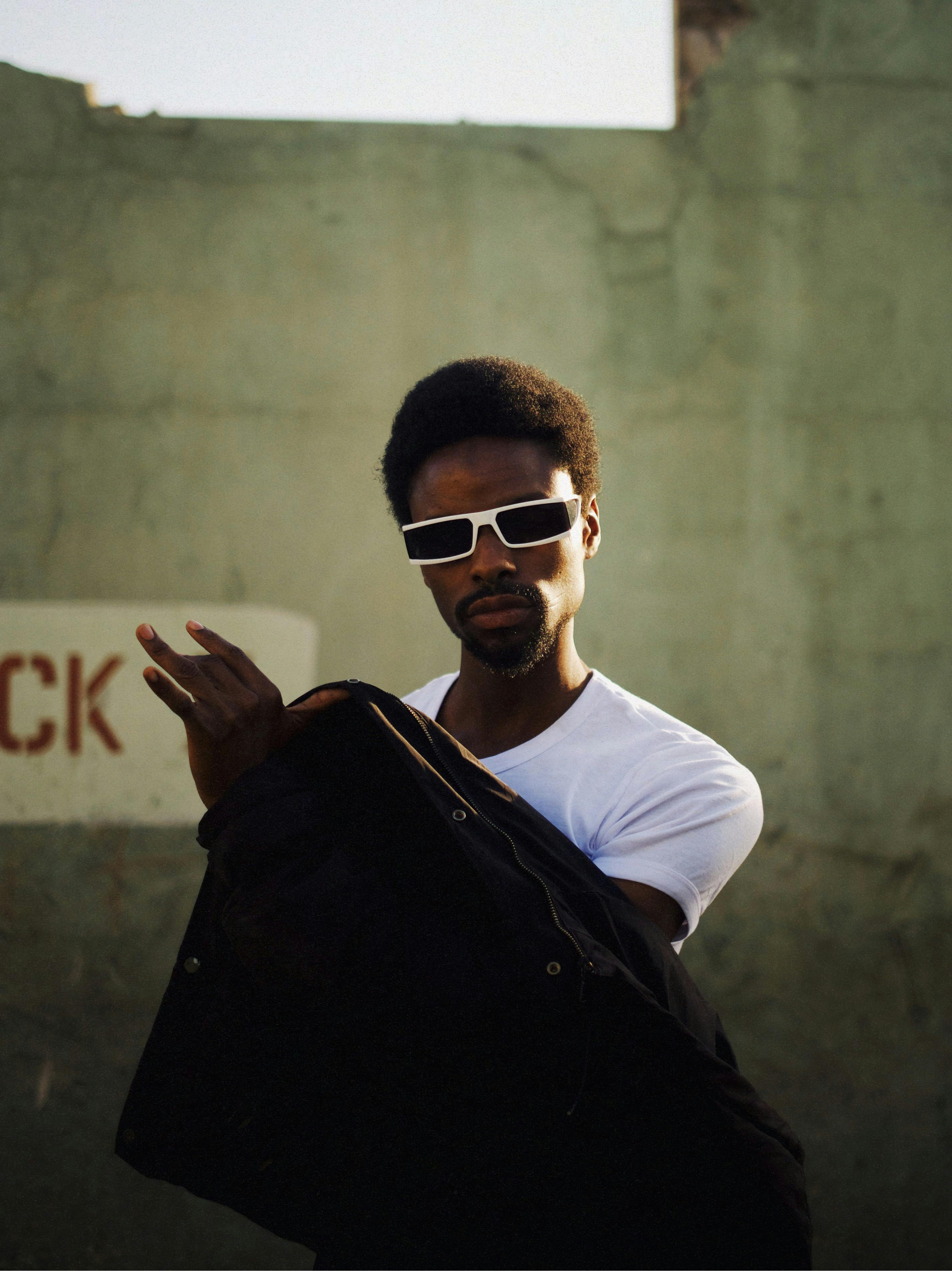 stylish man posing outdoors in kaduna