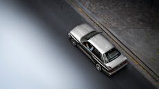 Aerial View of Vintage Car on Urban Street