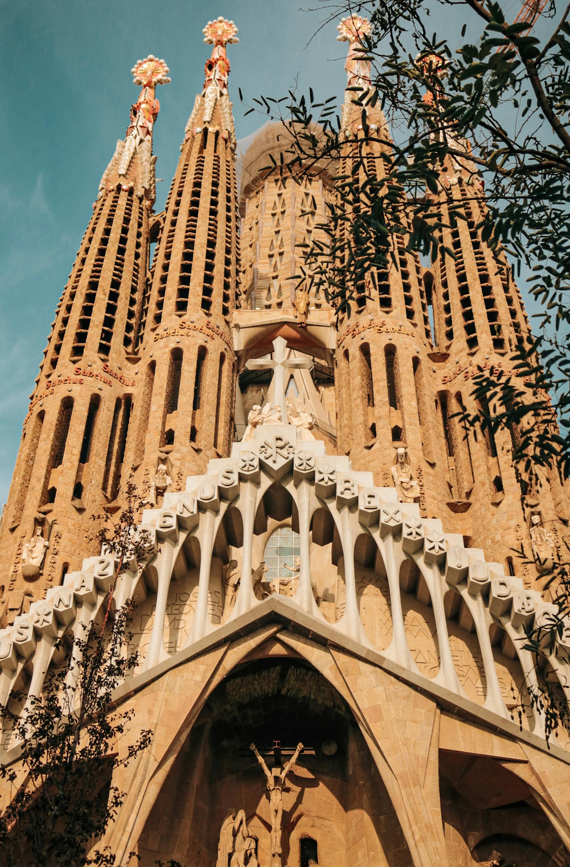 Stunning architectural facade of Sagrada Família basilica in Barcelona, Spain.