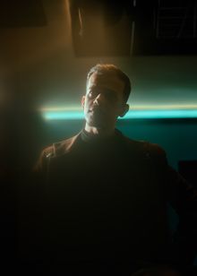 Portrait of a man with neon lighting, photo by khezez on Pexels