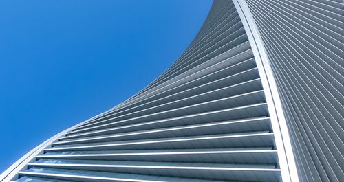 Free Stunning abstract view of modern architecture in Saudi Arabia, showcasing dynamic lines and futuristic design. Stock Photo