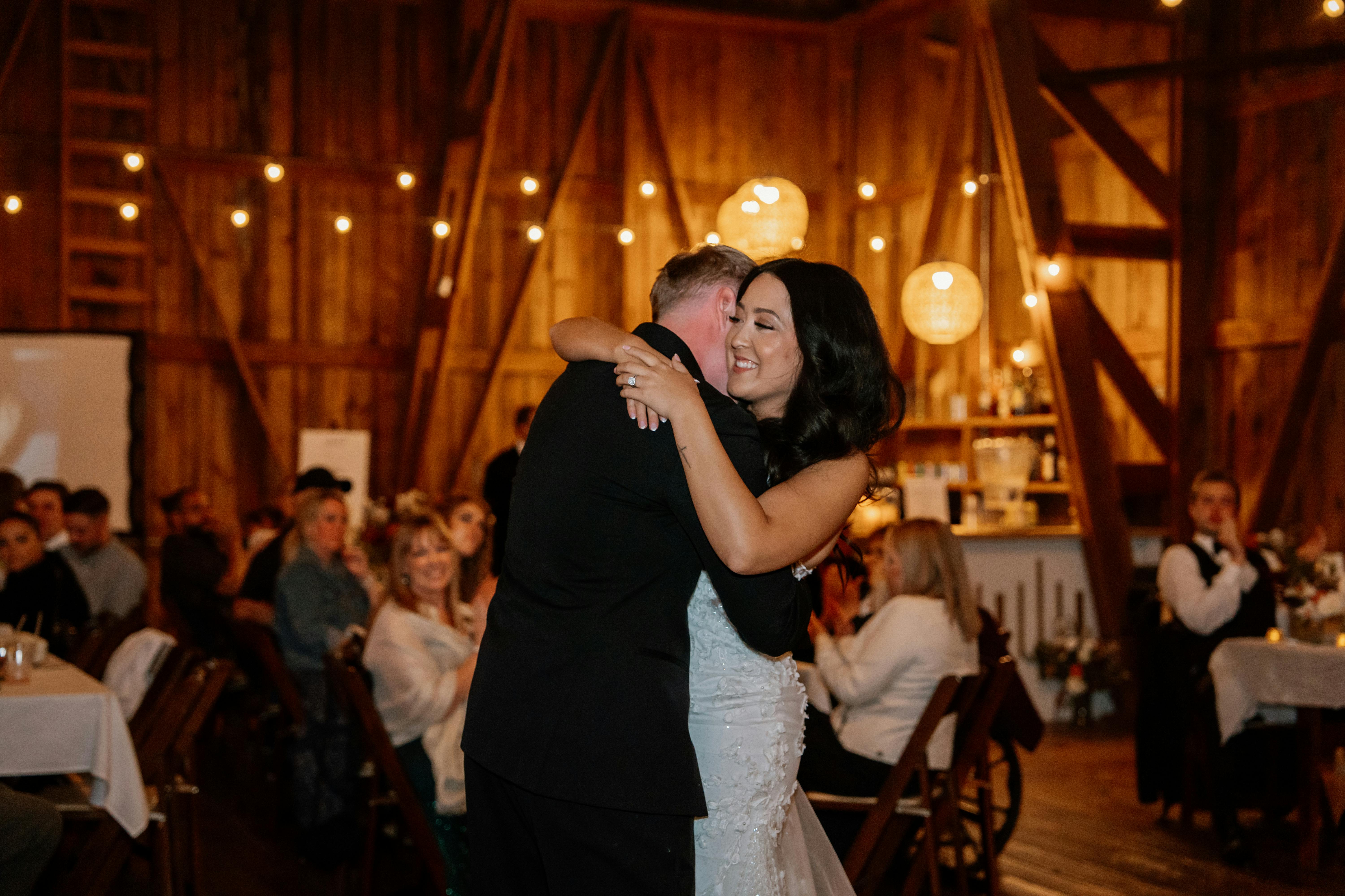 Couple celebrating at a barn wedding - barn weddings that allow outside caterers maryland