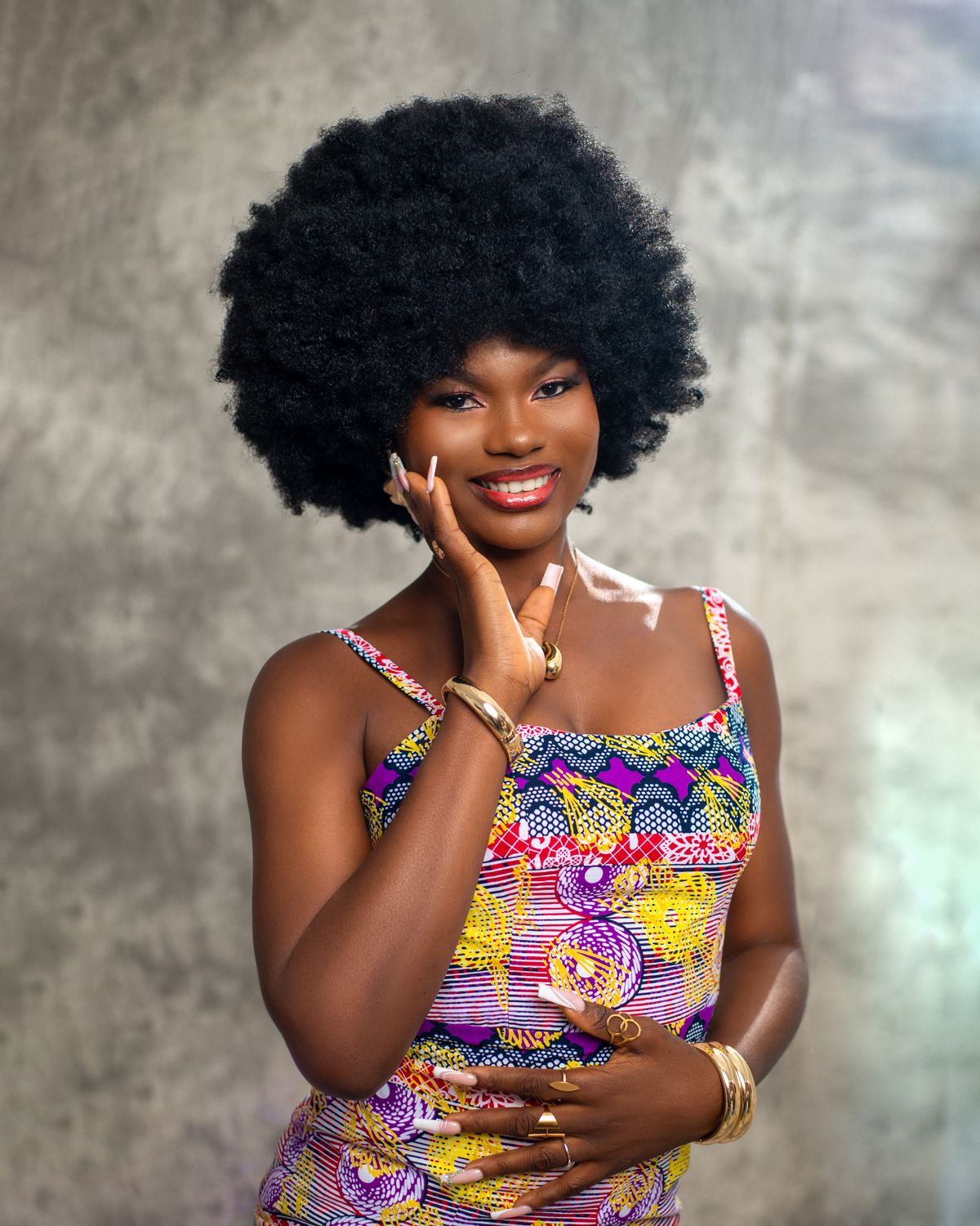 Portrait of Woman with Afro Hairstyle Smiling · Free Stock Photo