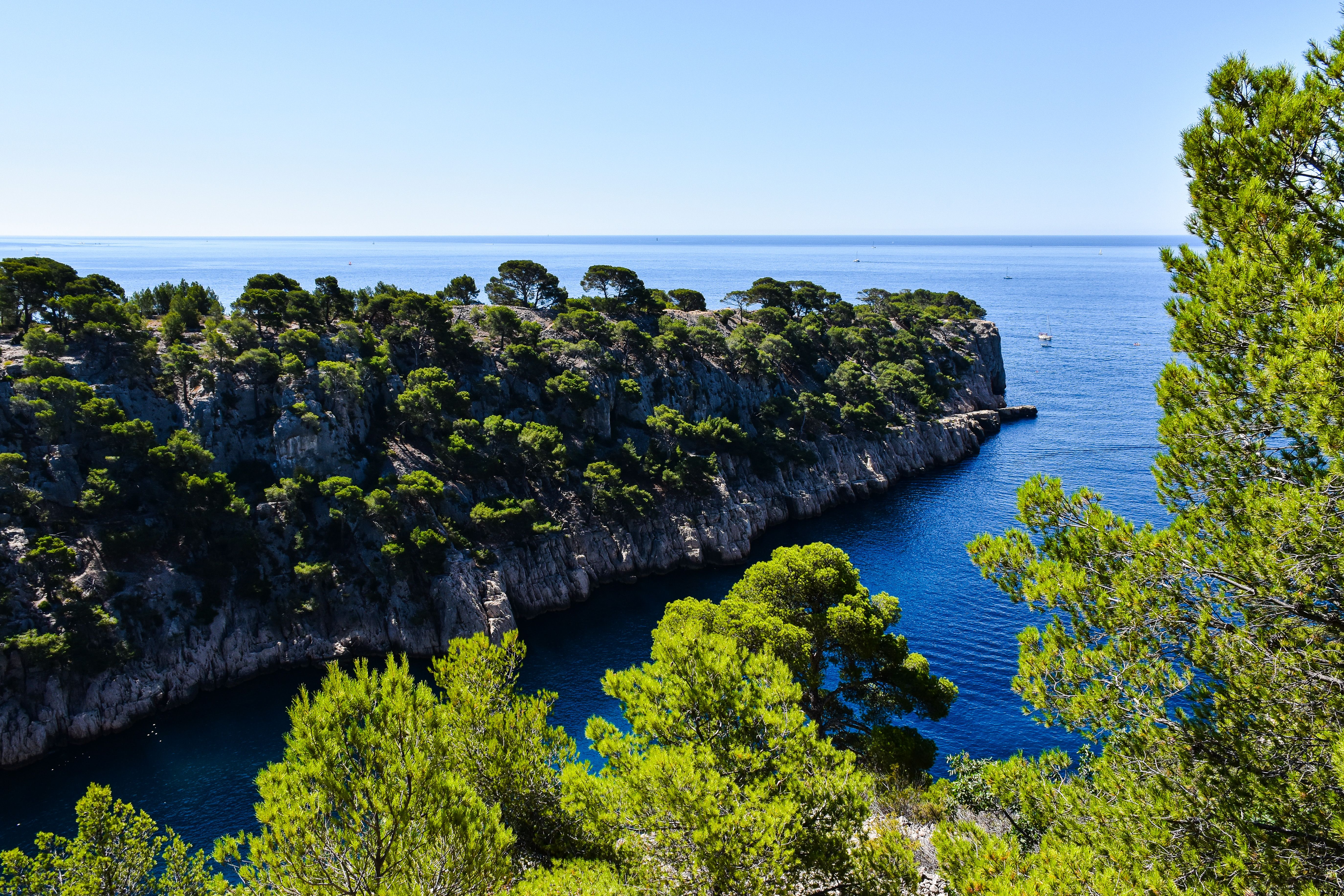 A breathtaking view of calanques and azure waters in Provence, France. A breathtaking view of calanques and azure waters in Provence, France.