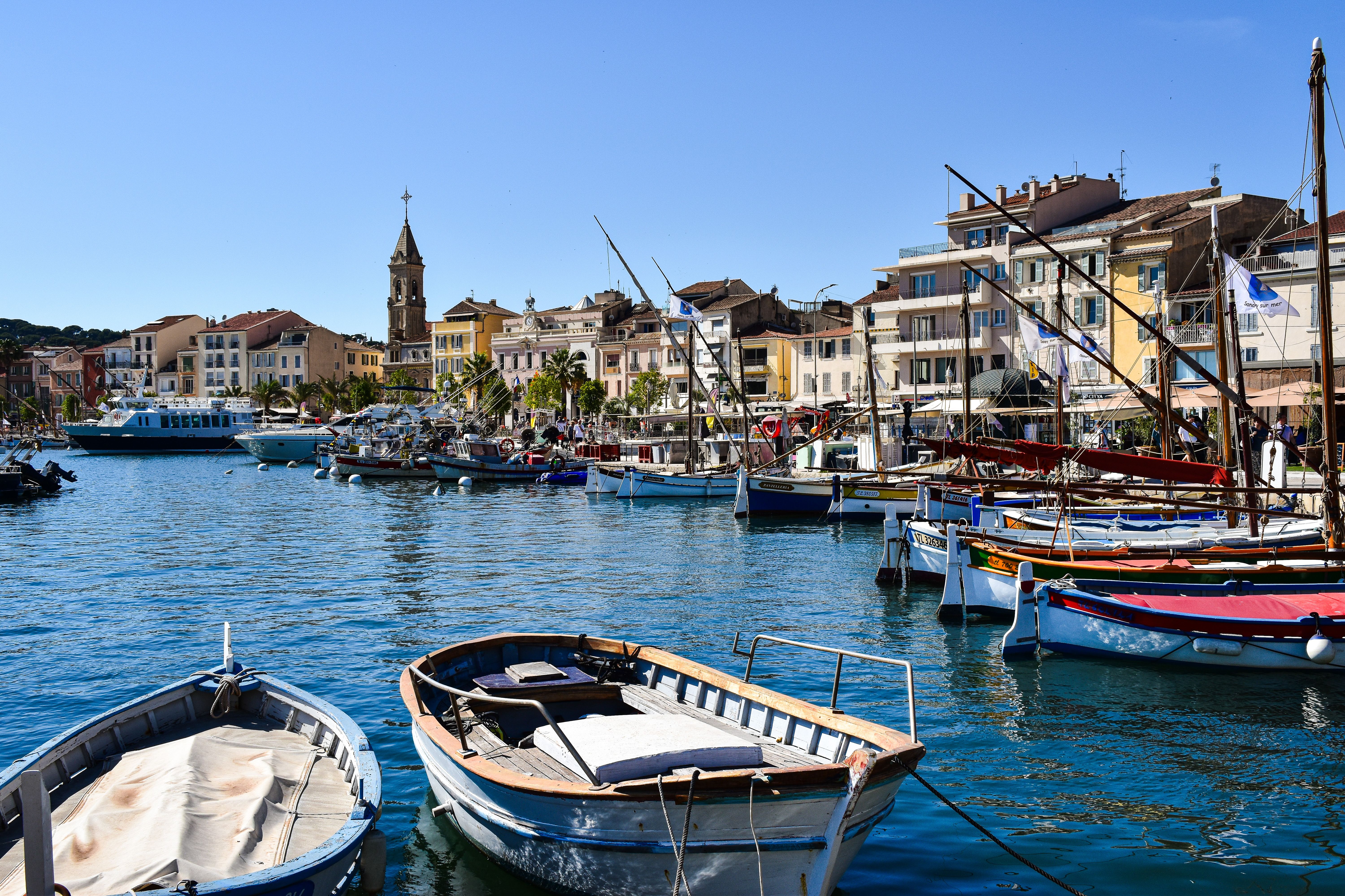 Vibrant port scene with colorful boats in Provence-Alpes-Côte d'Azur, France. Vibrant port scene with colorful boats in Provence-Alpes-Côte d'Azur, France.