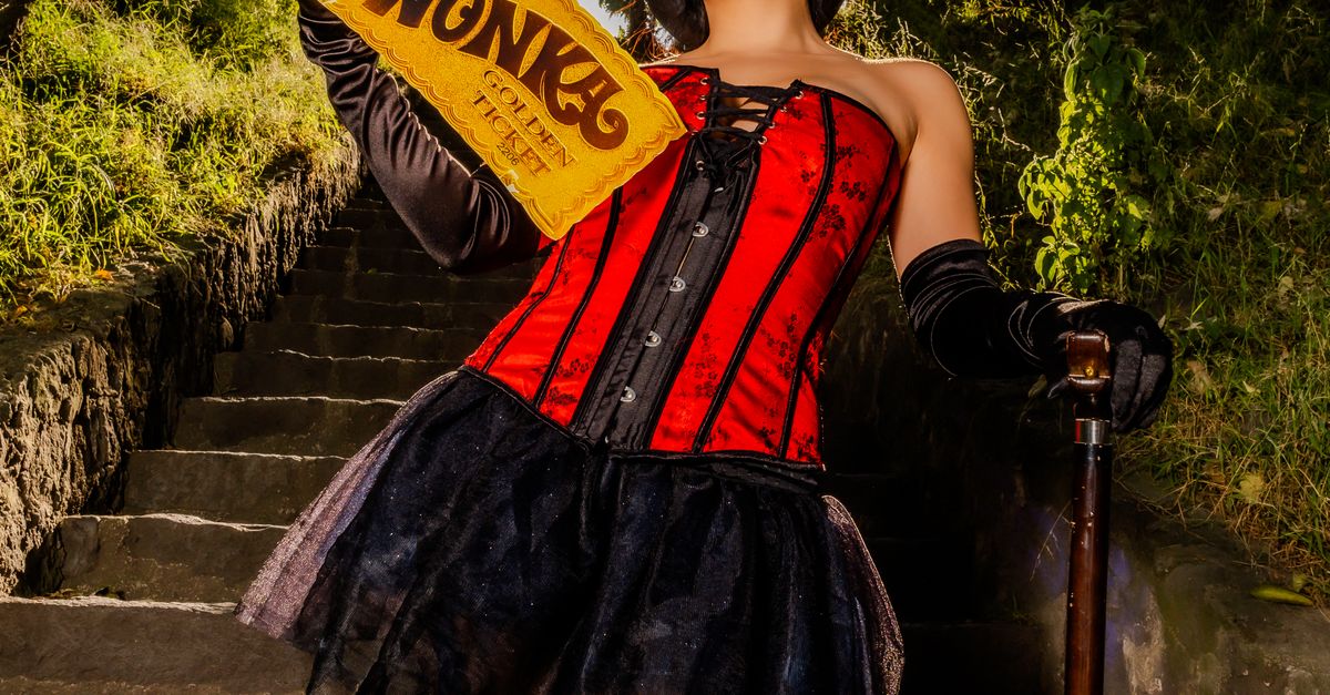 Retro Cosplayer Cosplayer in Retro Outfit Holding Golden Ticket · Free Stock Photo