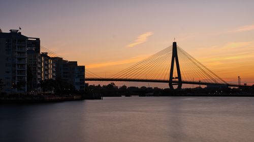 Free A captivating view of Anzac Bridge with a stunning sunset in Pyrmont, Sydney. Stock Photo