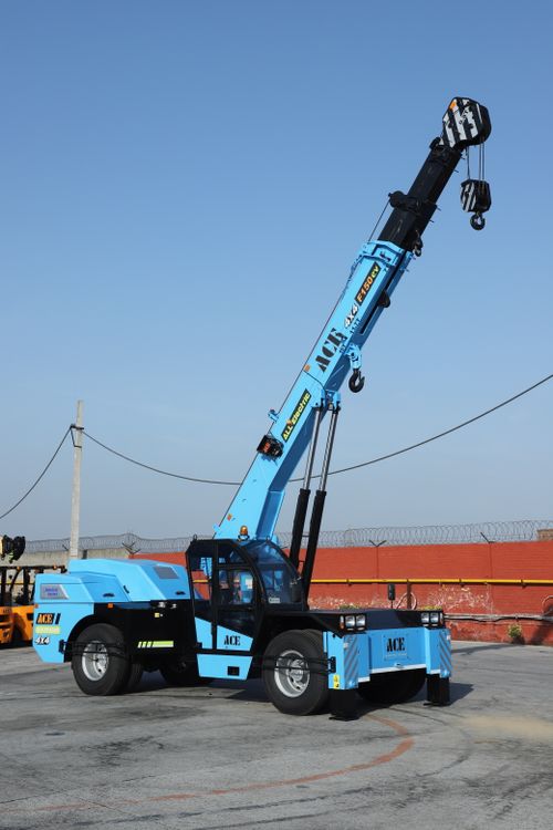 Free Industrial electric crane in a yard setting in India, showcasing advanced machinery. Stock Photo