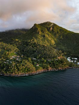 Stunning aerial shot of lush hills and coastline in the Philippines.