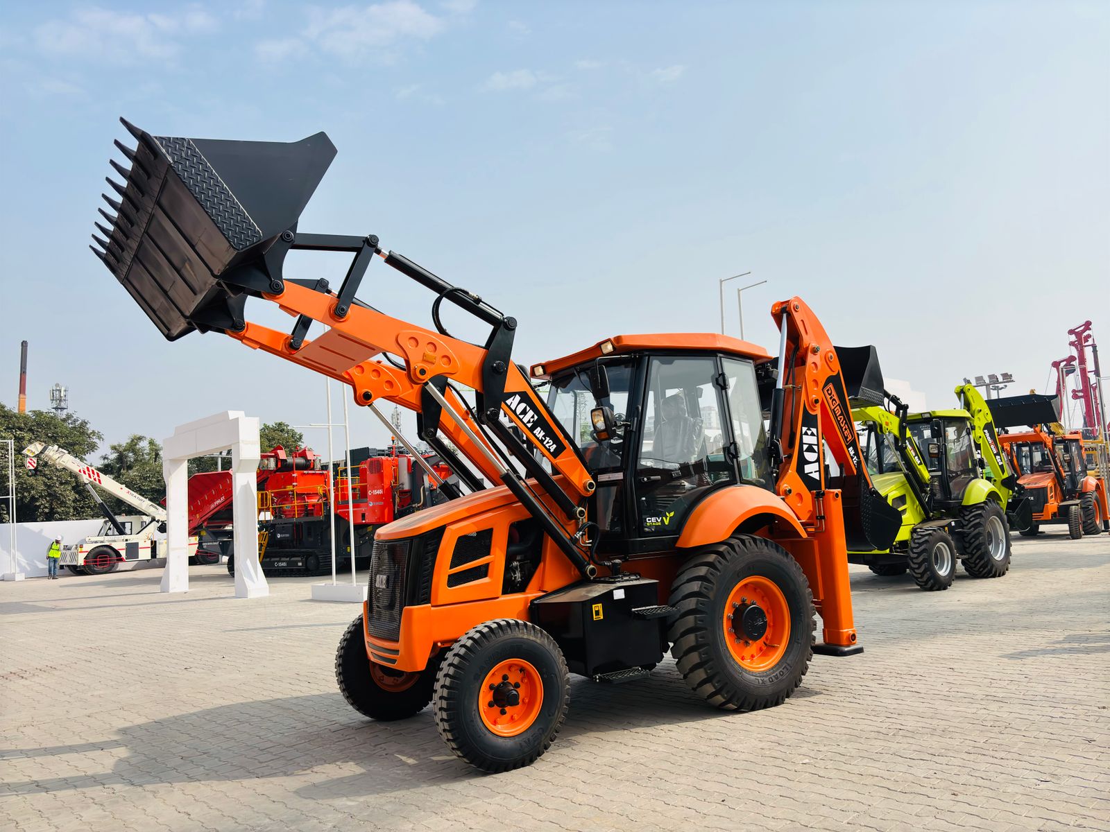 ACE AX 124 Backhoe Loader in Indian Construction Site · Free Stock Photo