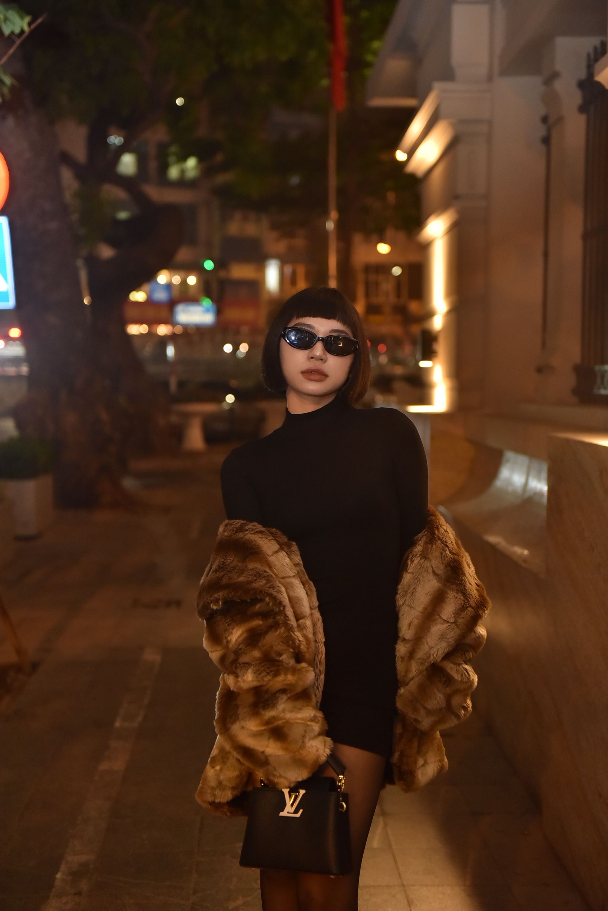 Stylish Woman at Night in Urban Setting · Free Stock Photo