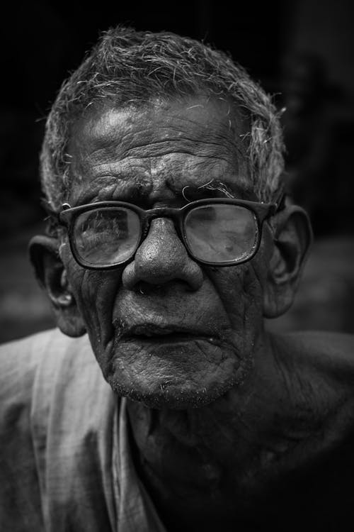 Man Wearing Black-framed Eyeglasses