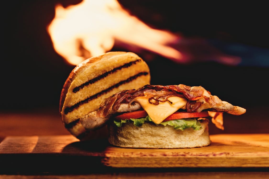 Free Burger With Cheese, Tomatoes, and Lettuce Stock Photo