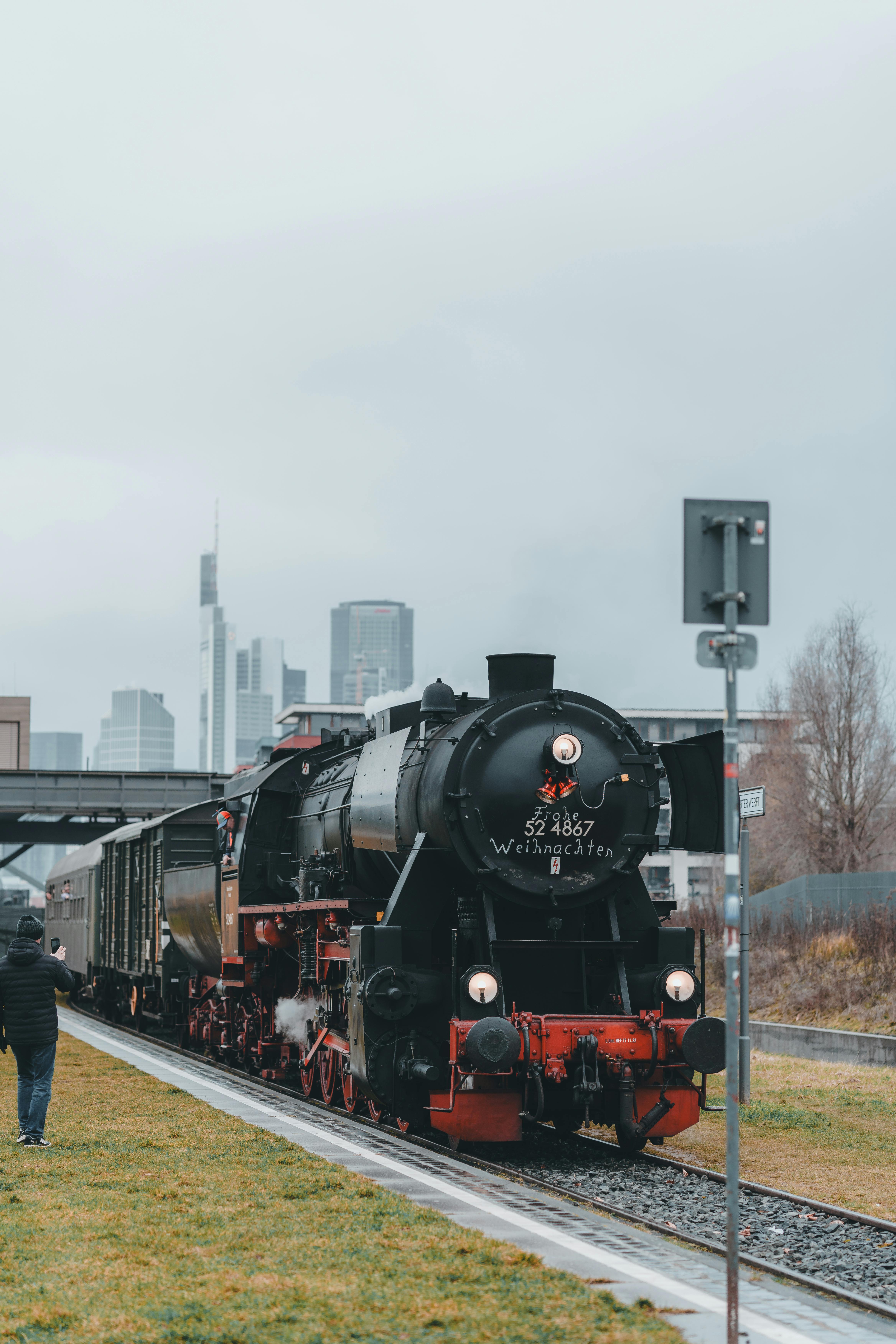 vintage steam train in urban landscape