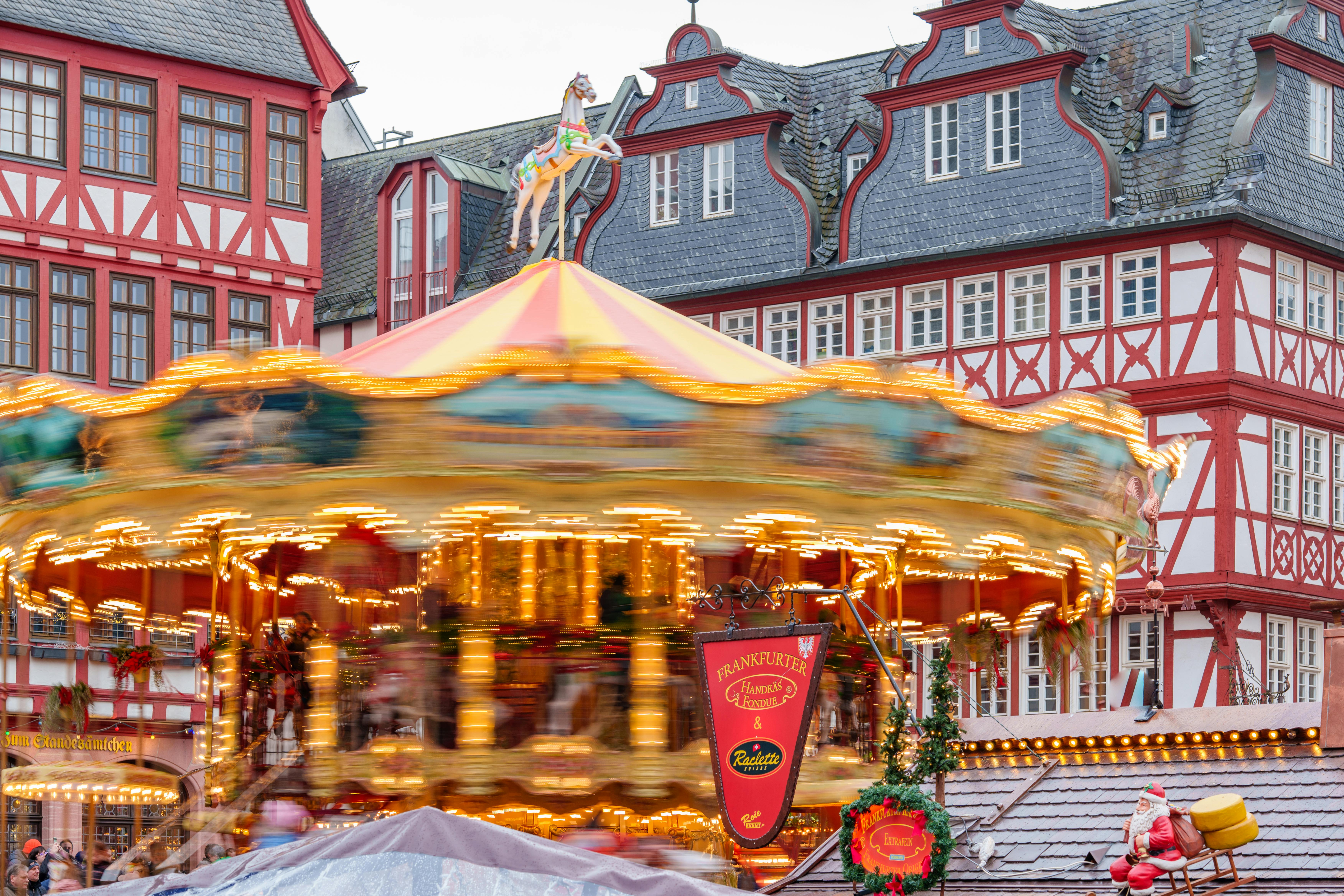 colorful carousel in historic frankfurt square