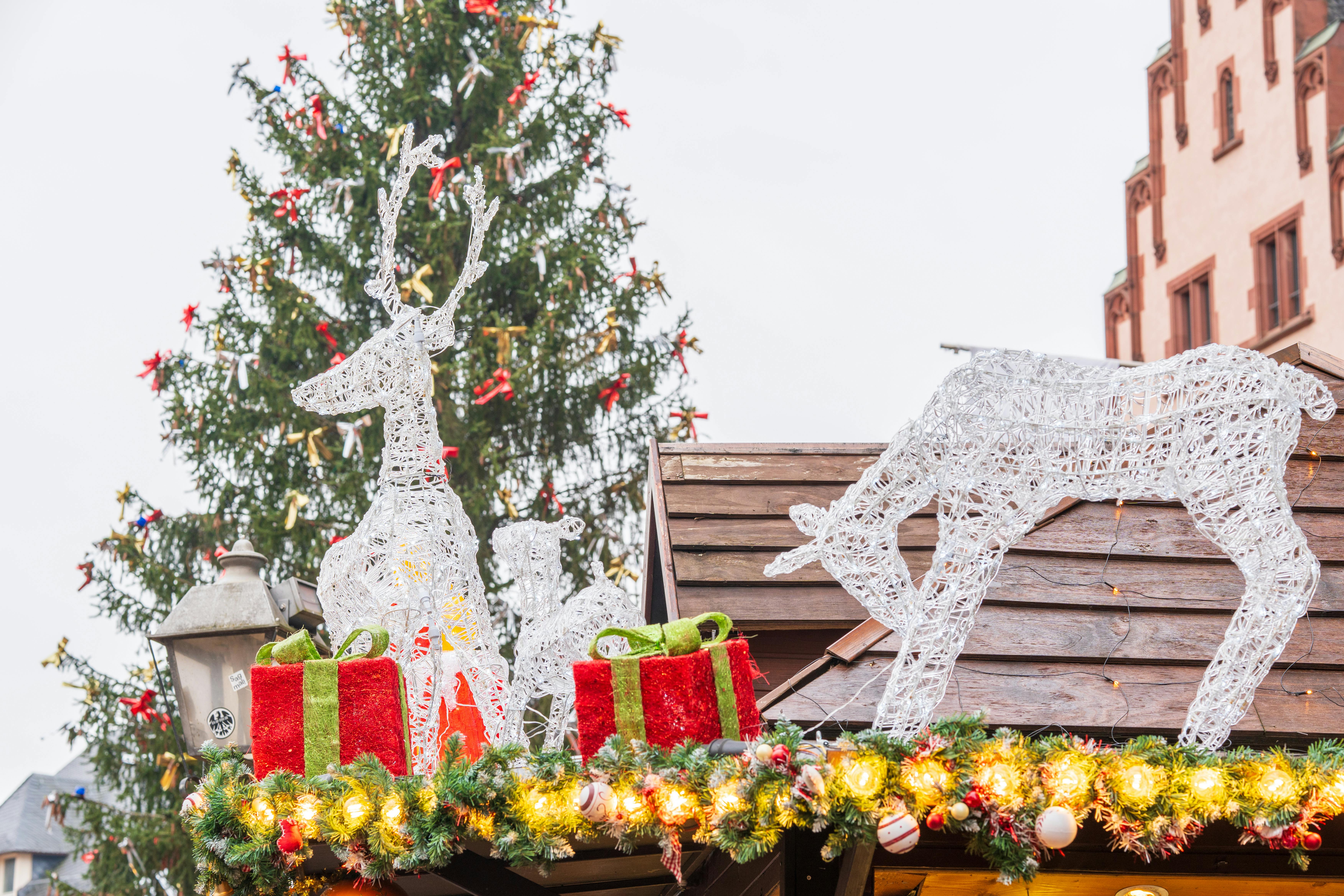 festive christmas market with lighted reindeer