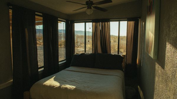 Bedroom interior with warm light and cozy atmosphere