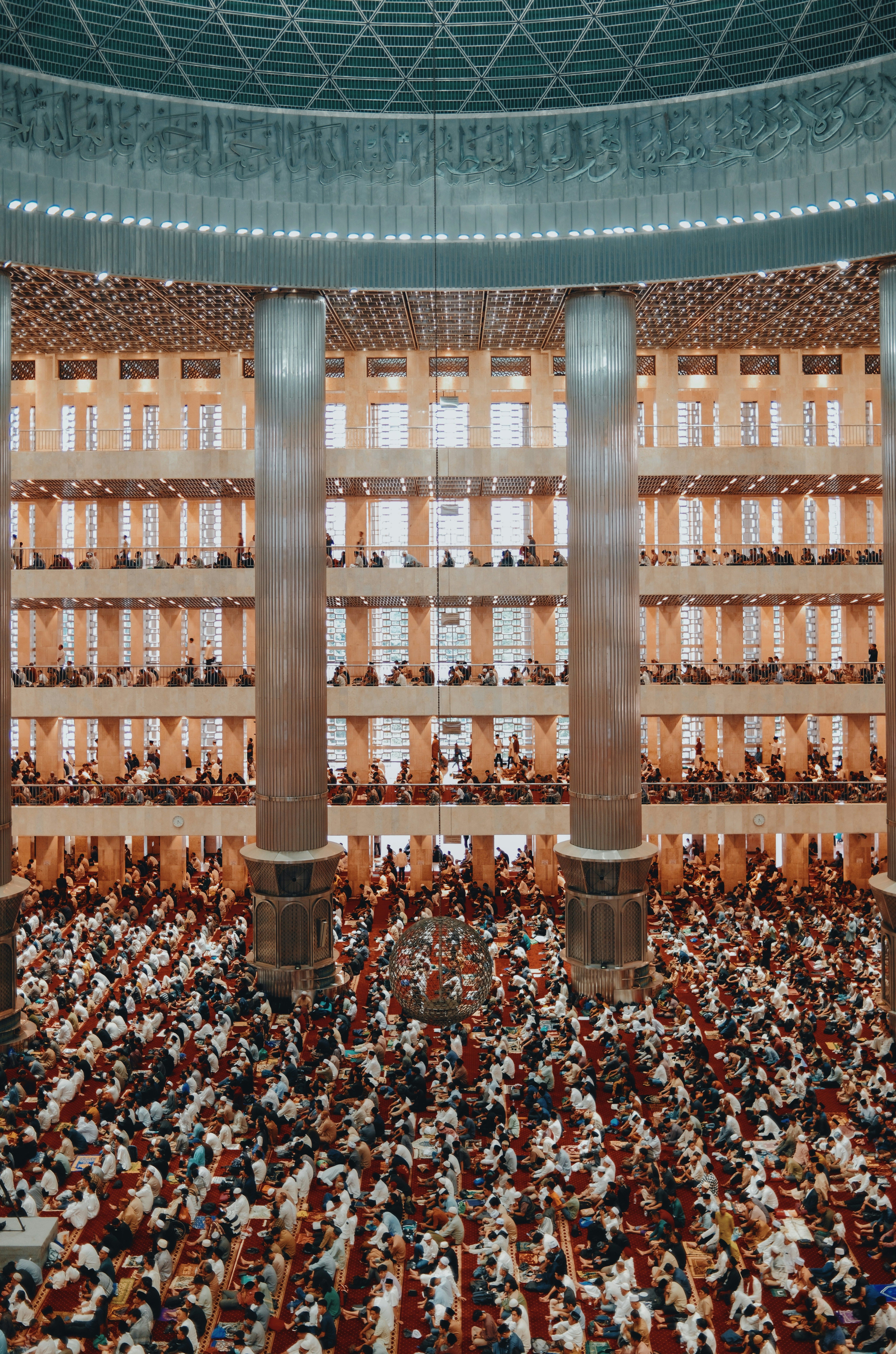 Crowd gathered for prayer inside the majestic Istiqlal Mosque, Jakarta.