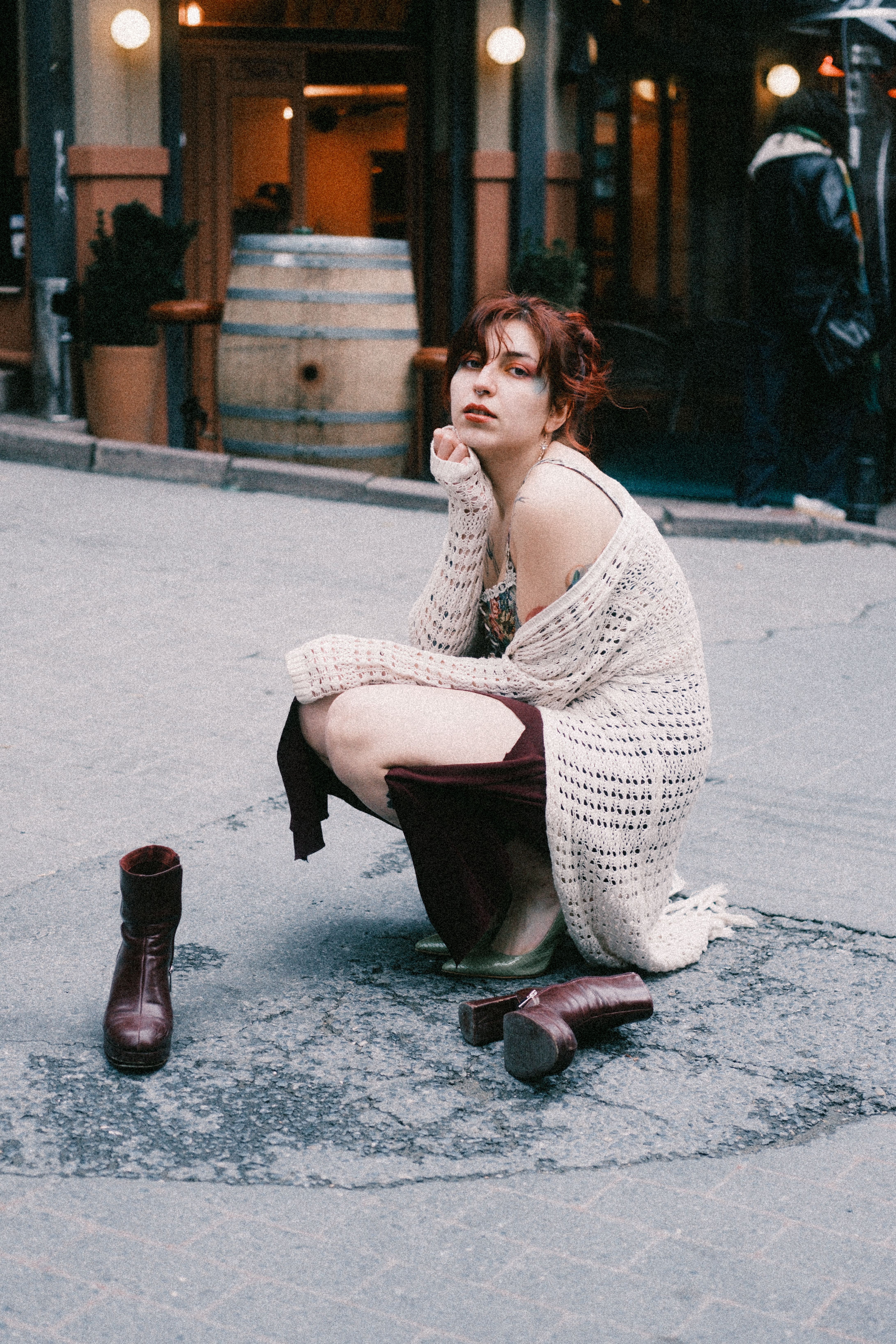 Contemplative Woman in Urban Street Scene · Free Stock Photo