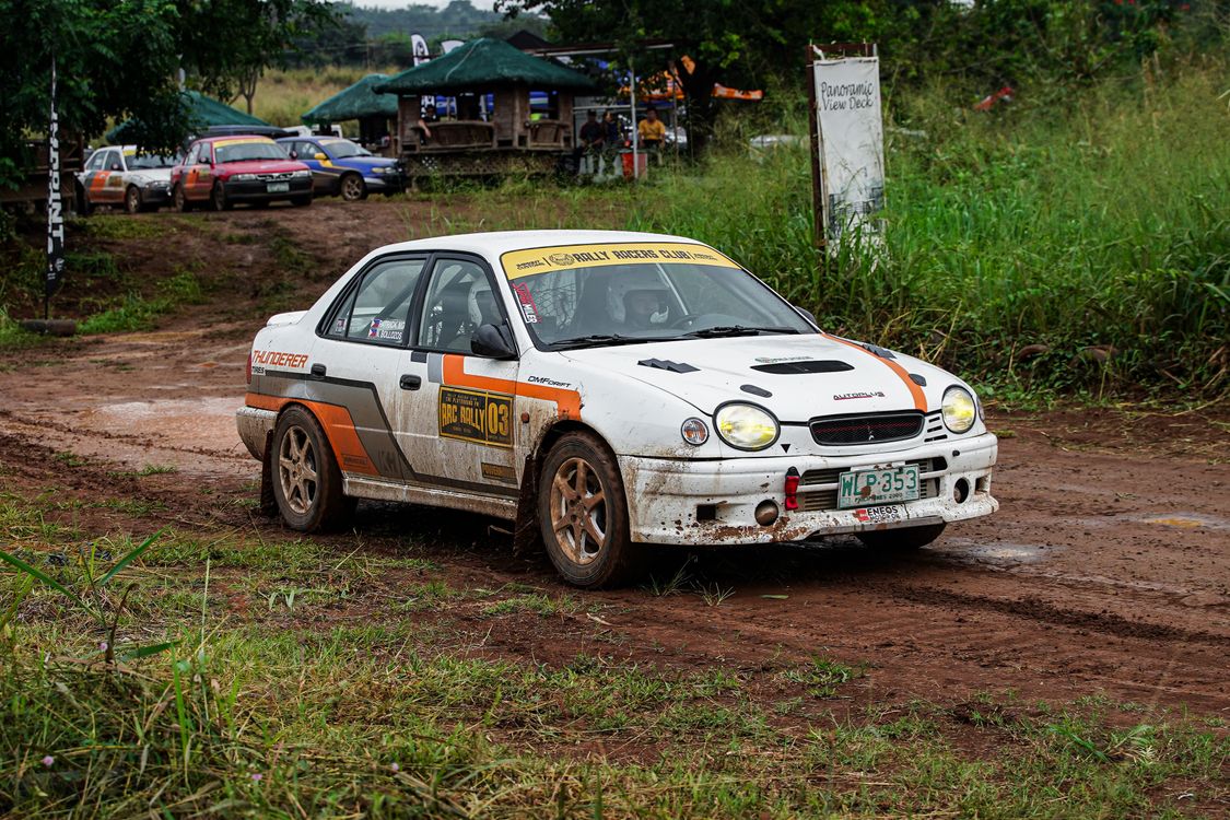 Woops Tracks Rallye Dynamic Rally Car Racing on Muddy Track · Free Stock Photo