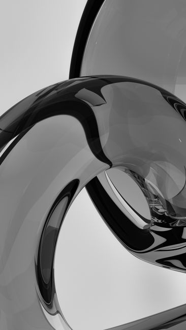 Sleek black and white abstract glass sculpture with elegant curves in a minimalist style.