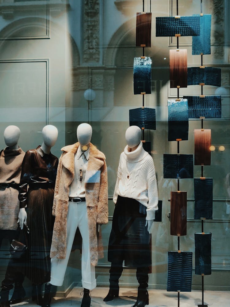 Mannequins On Store Window