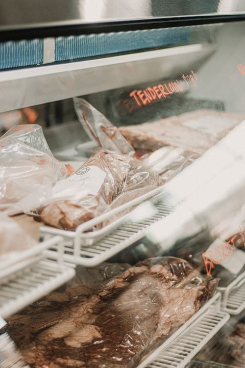 Free Freshly cut high-quality meats on display in a South Carolina butcher shop. Stock Photo