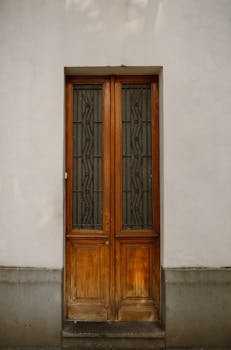 A vintage wooden door with intricate design in Mexico City, Mexico.