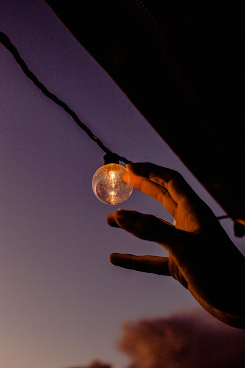 Free Person Reaching Led Light Stock Photo