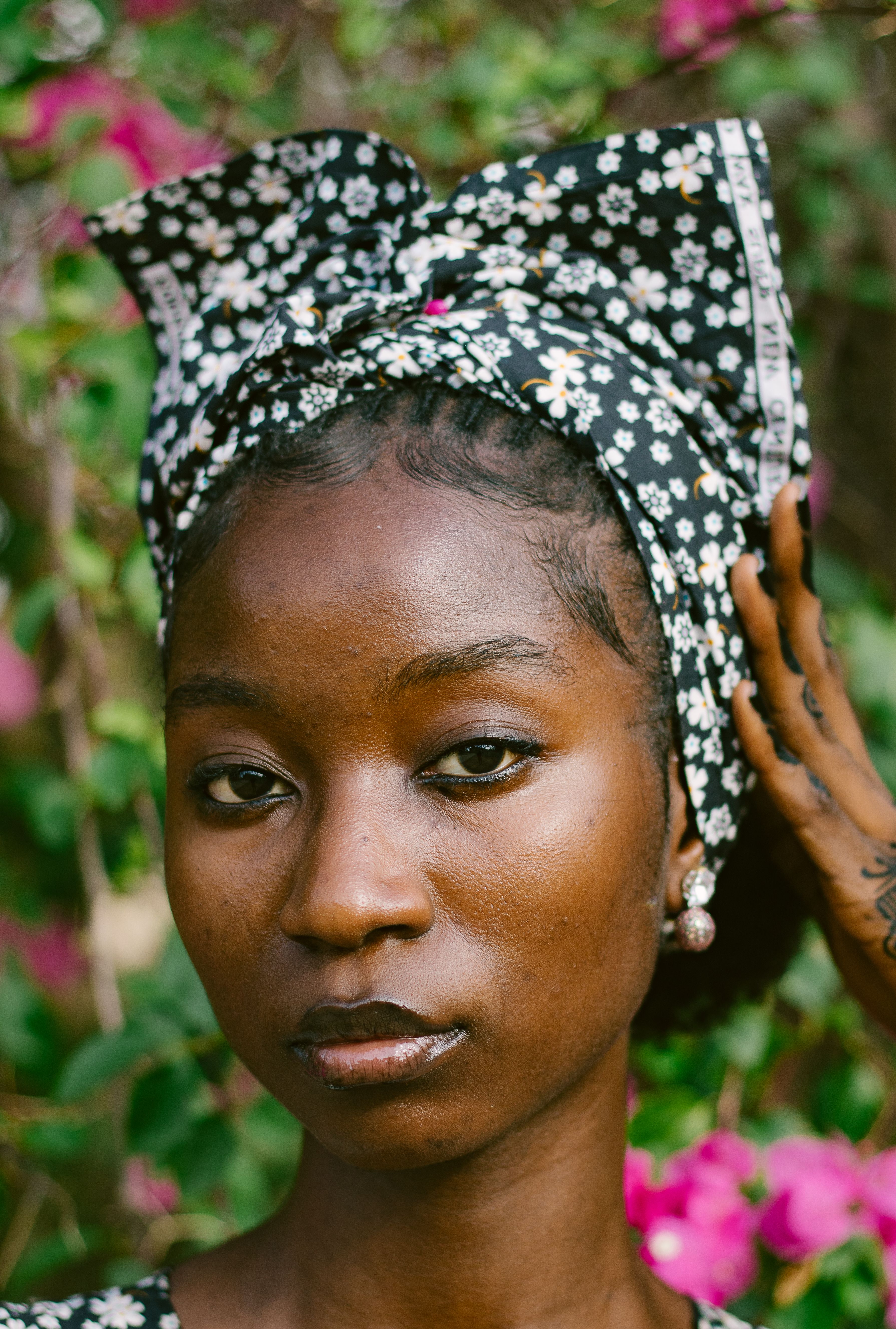 Portrait of Stylish Woman with Floral Headscarf Outdoors · Free Stock Photo