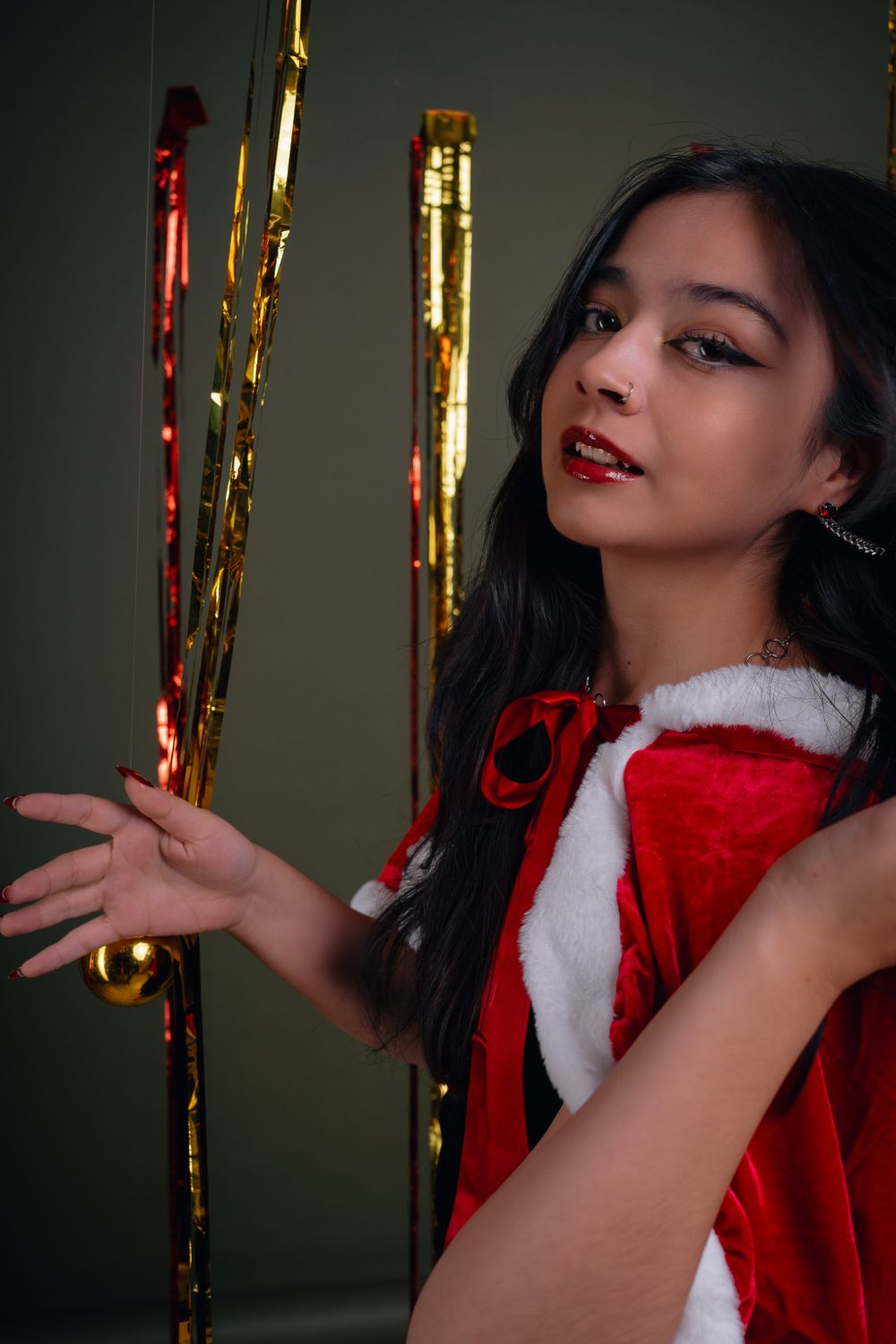 Streamer Santa Festive Woman in Santa Costume with Streamers · Free Stock Photo