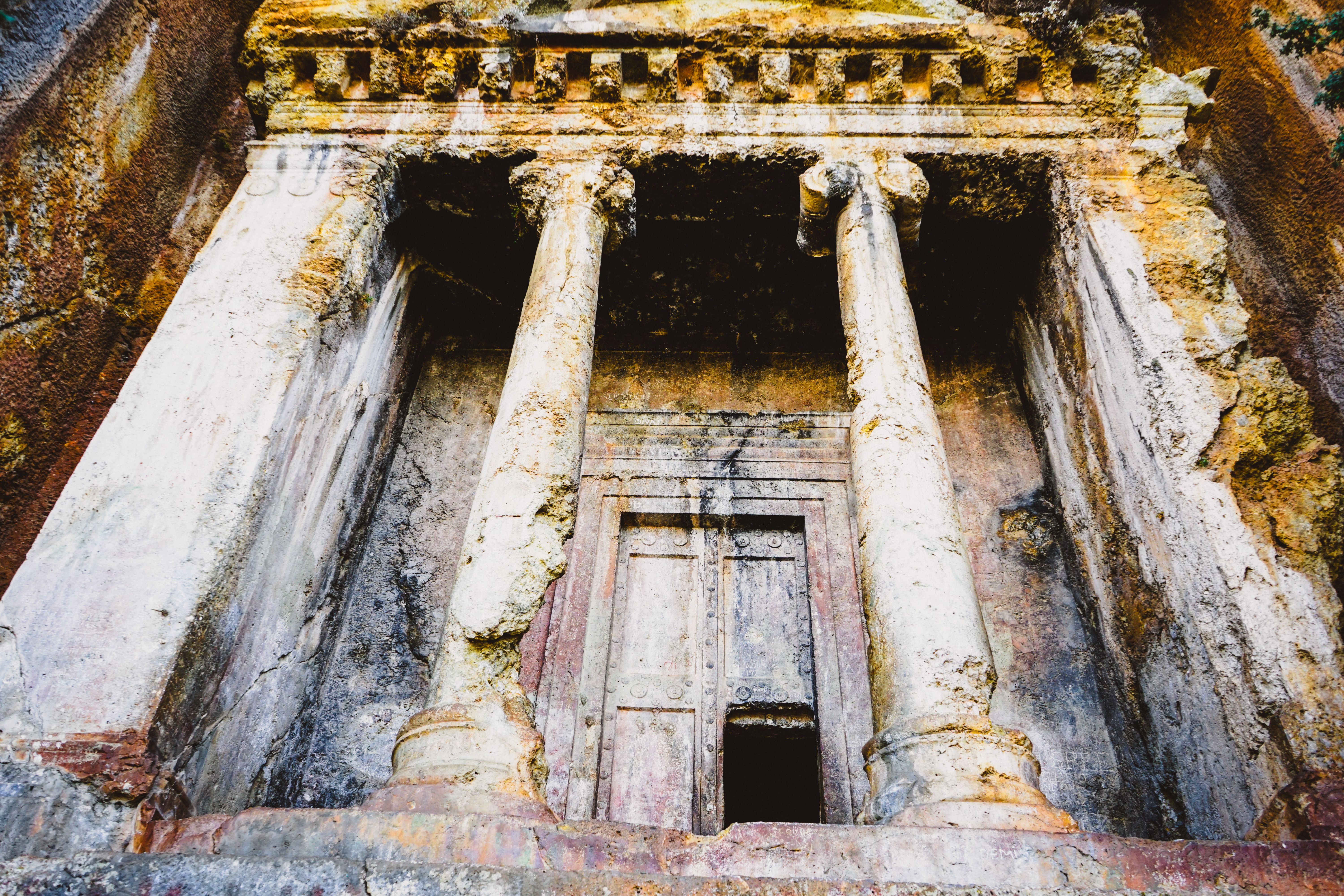 Ancient rock cut tomb in mugla turkiye, Uganda
