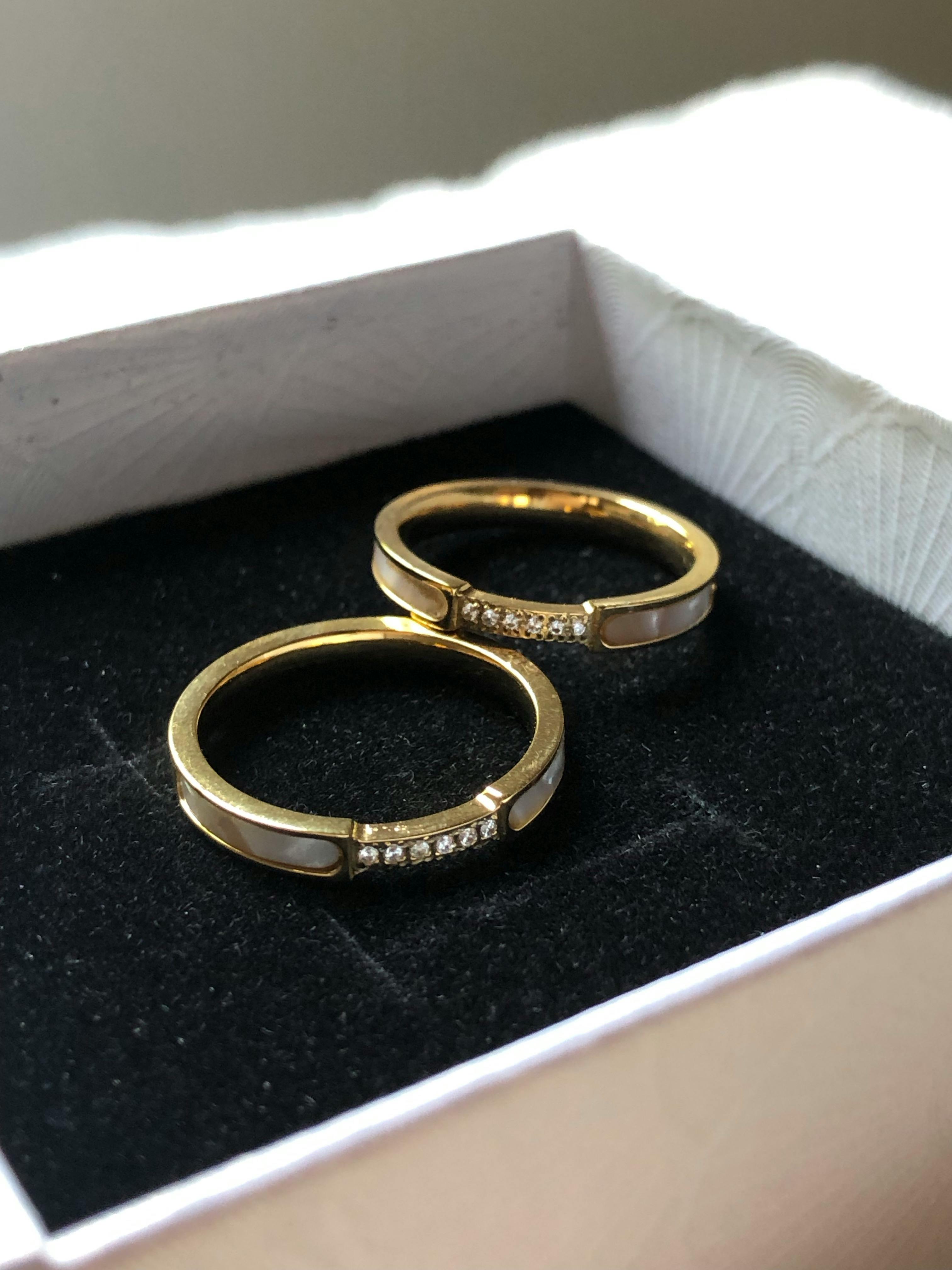 elegant gold wedding rings in jewelry box