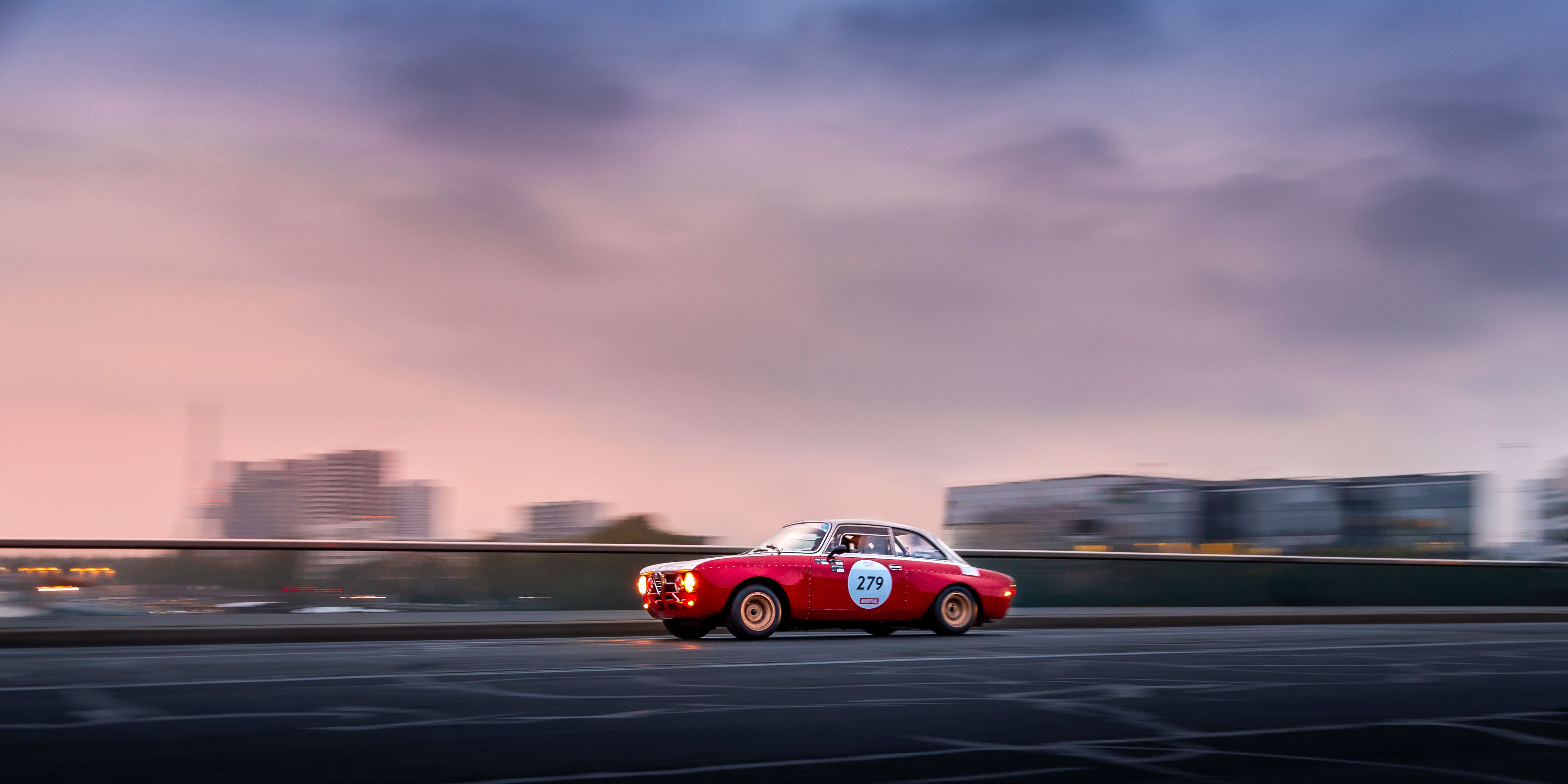 Vintage Car Racing at Twilight in Paris · Free Stock Photo