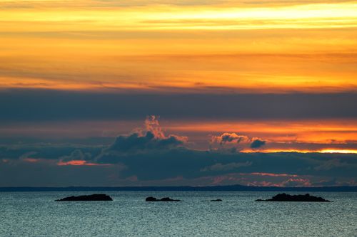 Free Glorious sunrise at Stamford, Connecticut with vibrant sky and calm sea. Stock Photo