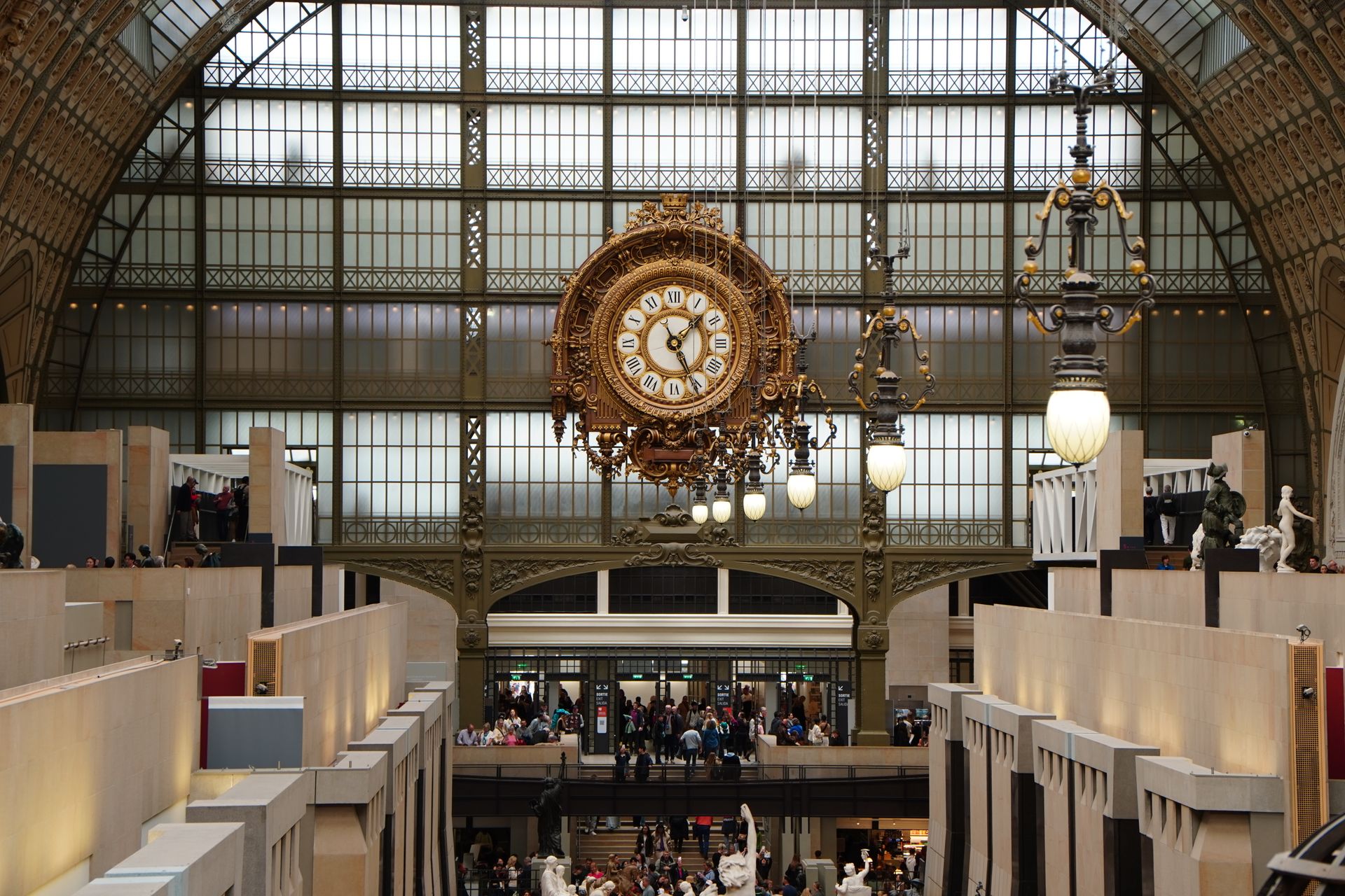 View inside Musée d'Orsay in Paris showcasing the grand clock and art gallery interiors.