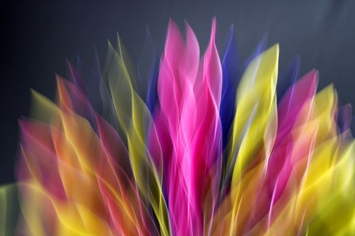 Free Blurred abstract light painting in vibrant colors, creating a dynamic and playful visual effect. Stock Photo