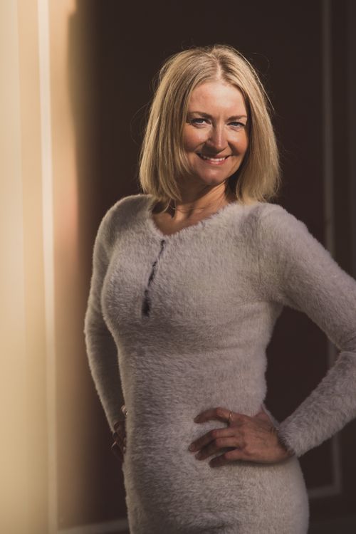 Stylish Woman Posing in Natural Light · Free Stock Photo