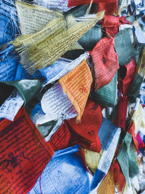 Free Vibrant prayer flags fluttering in Namche, Nepal, symbolize peace and harmony. Stock Photo
