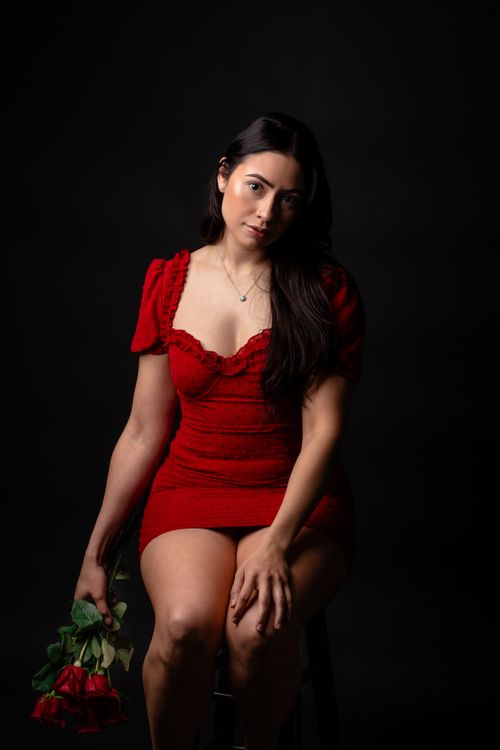 Elegant Woman in Red Dress Sitting on Chair · Free Stock Photo