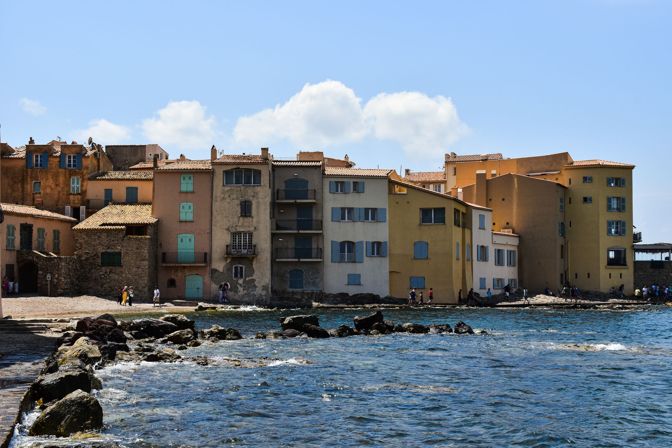 Picturesque waterfront buildings in Saint-Tropez, capturing Mediterranean charm.