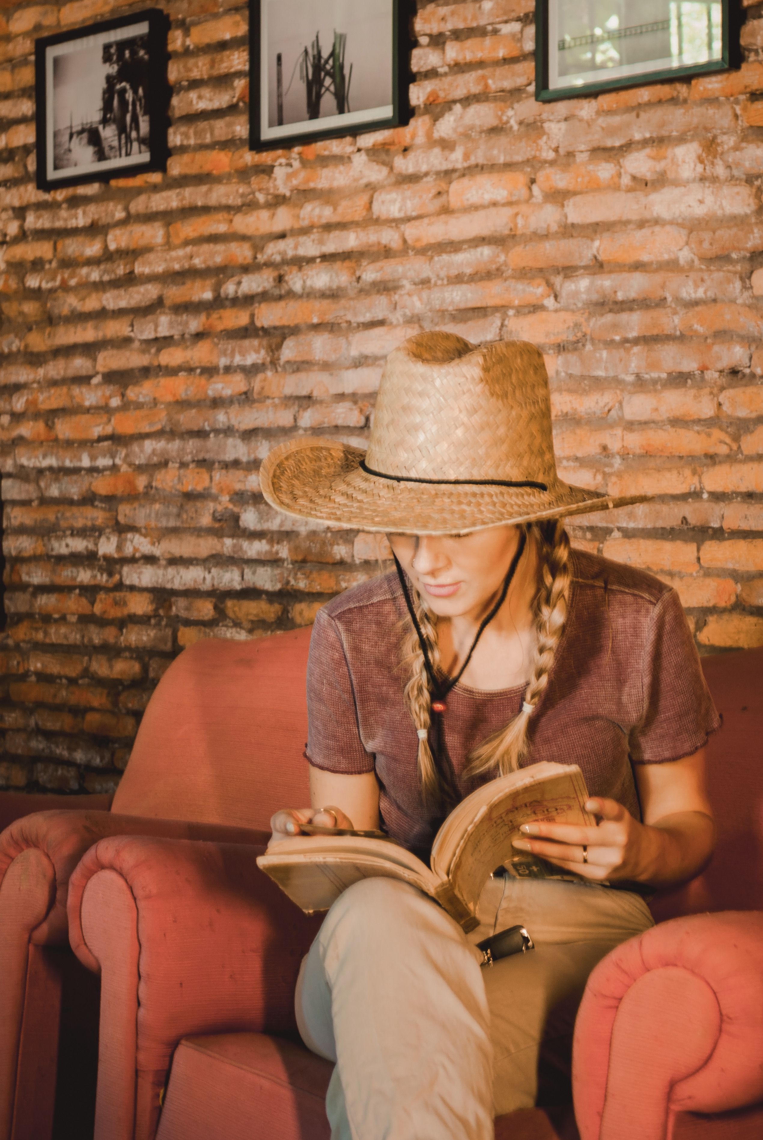 Woman Reading Book in Cozy Rustic Setting · Free Stock Photo