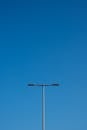 Minimalist Streetlight Against Clear Blue Sky