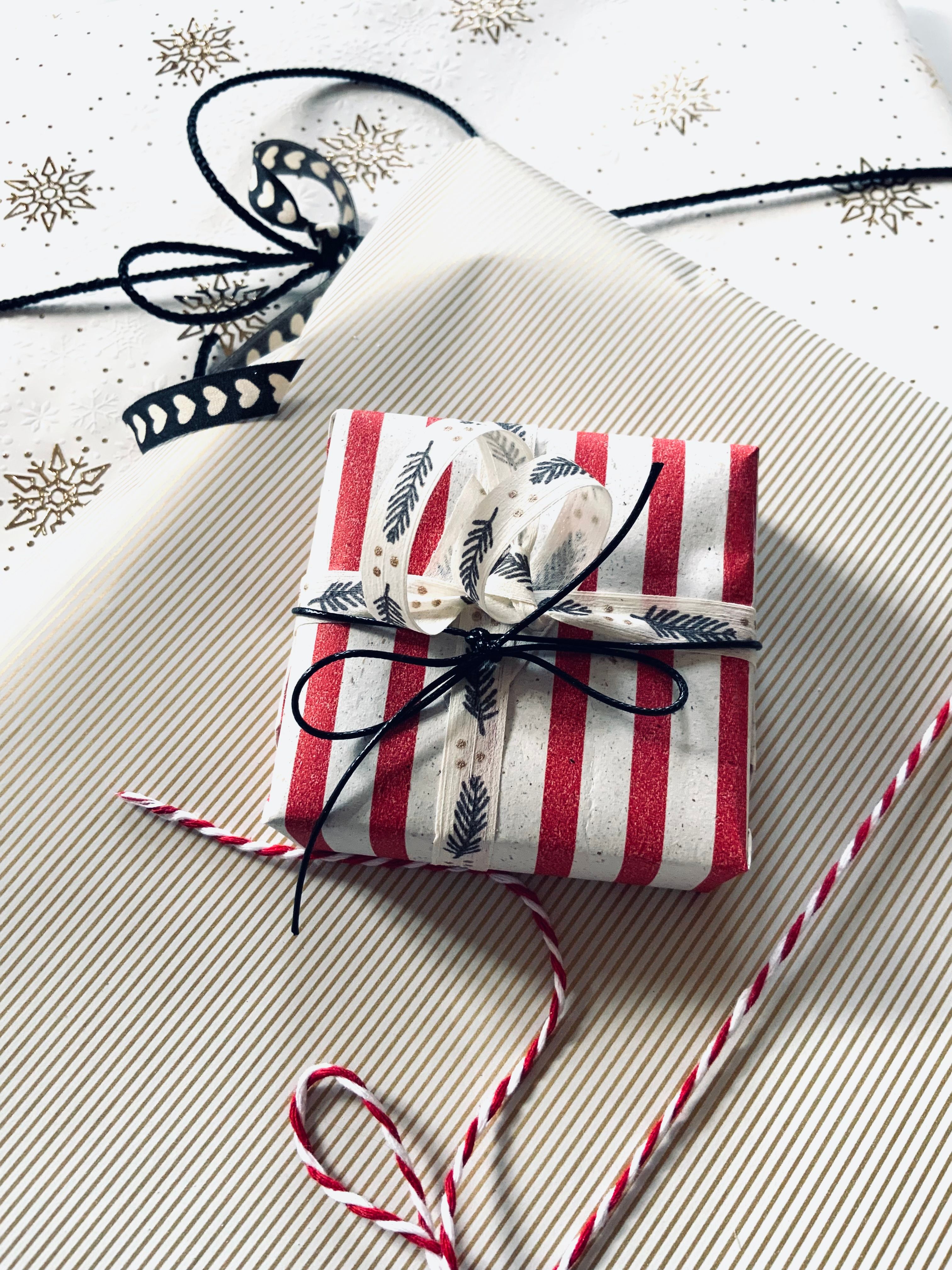 Festive Wrapped Gifts with Striped Design · Free Stock Photo