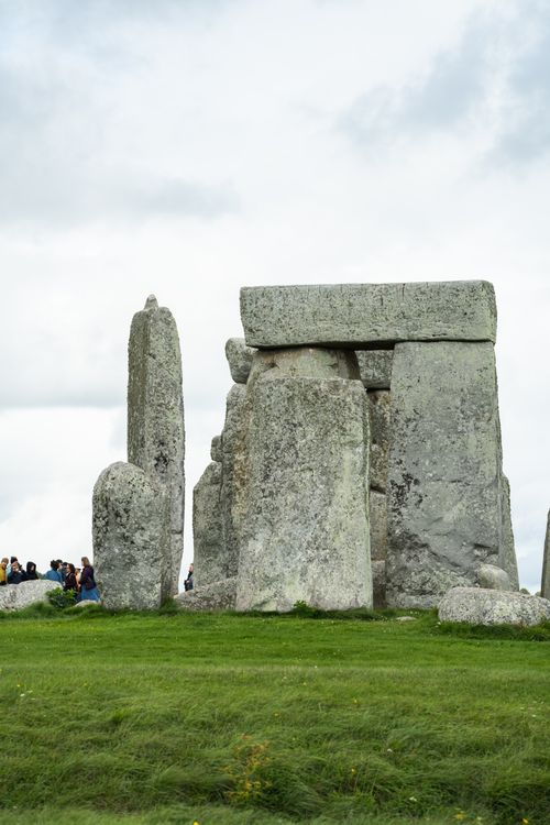 Free Explore the enigmatic Stonehenge with its iconic stone structures and cloudy backdrop. Stock Photo