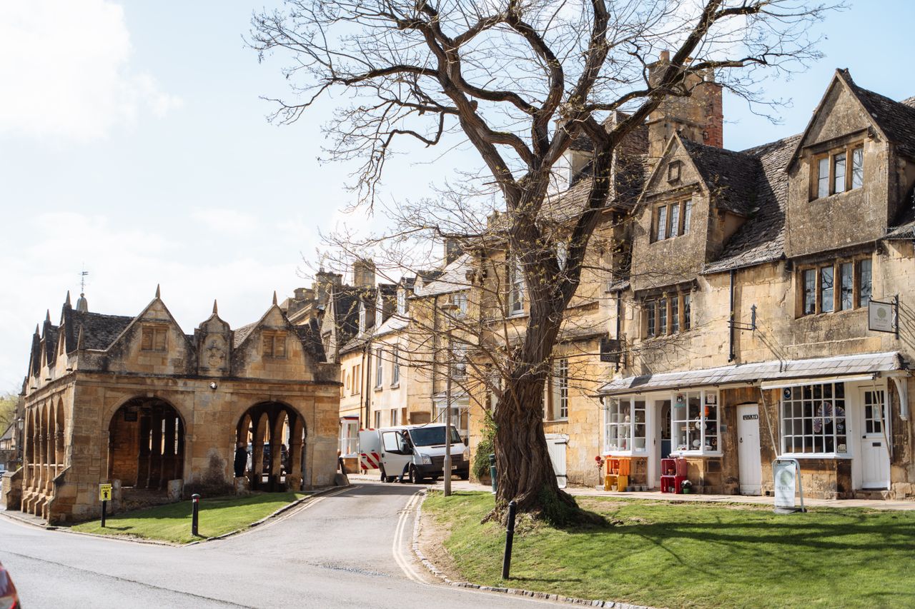 The historic Market Hall and honey-stone High Street of Chipping Campden, where the Cotswold Way begins