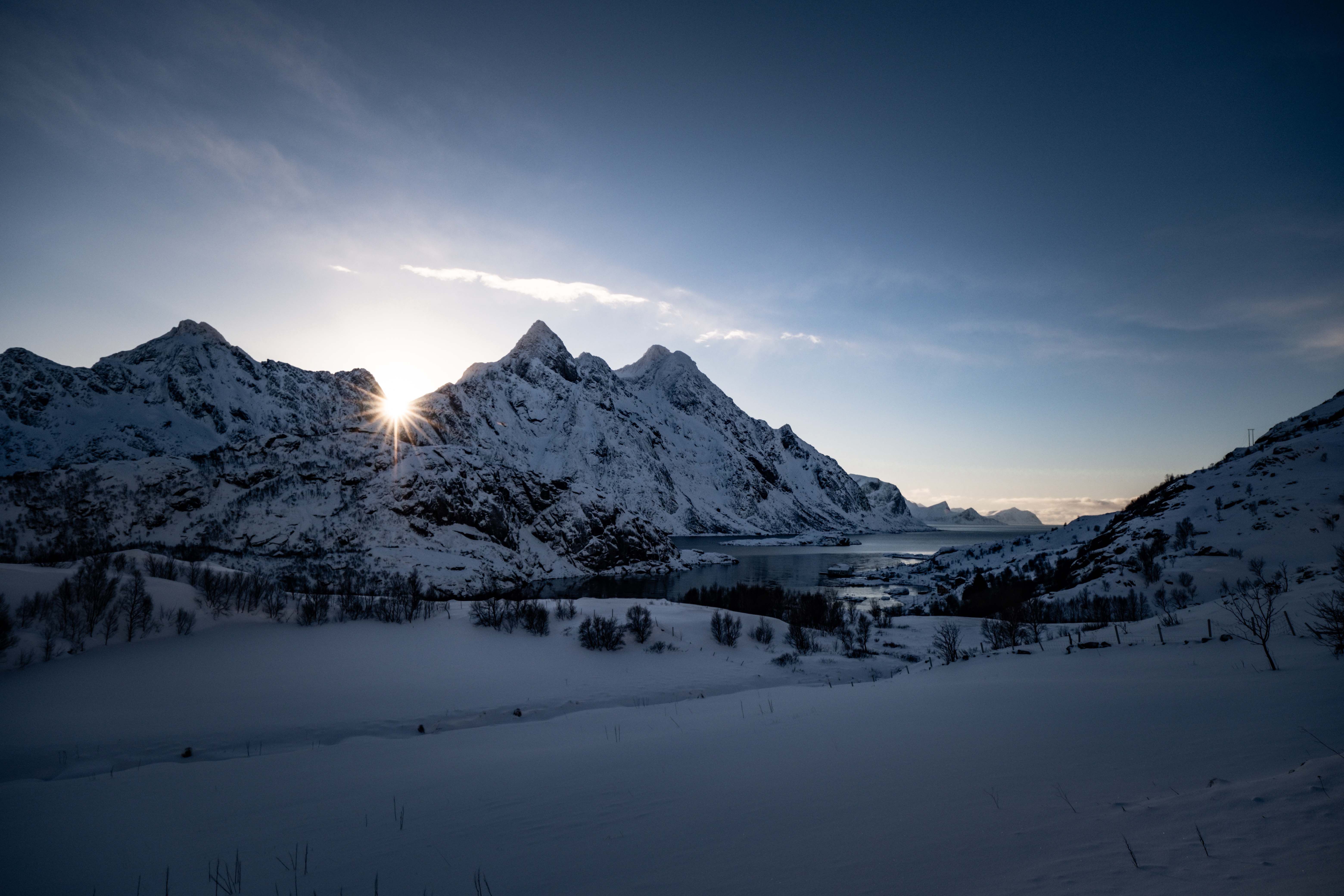 Stunning Winter Sunrise Over Snowy Mountains · Free Stock Photo